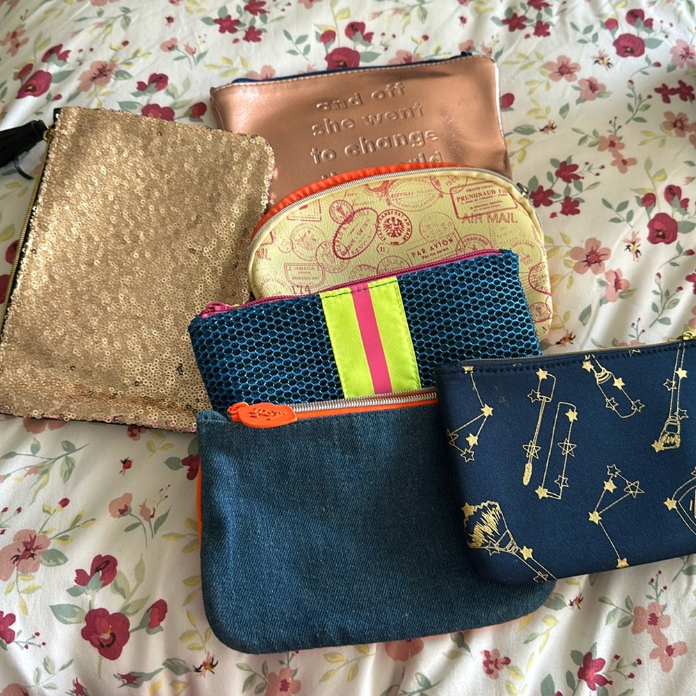 Empty IPsy zipper pouches